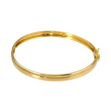 Armring, 18K guld, slät modell, rund form, öppningsbar, tillverkare Osab, svensk kontrollstämpel, inre omkrets 18,0 cm, bredd 5,5 mm, fint skick, något minimalt obetydligt märke på skenan nära låset Vikt: 11,6 g
