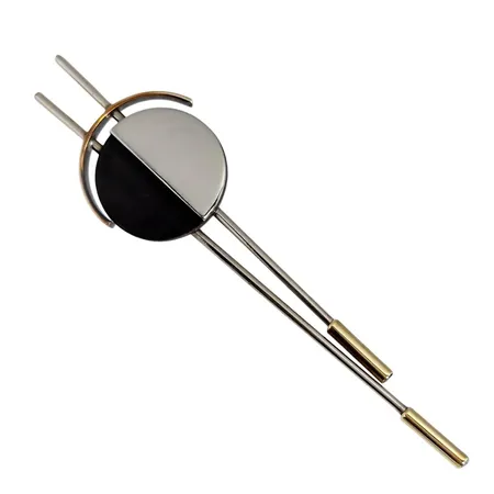 Brosch "Plangeometrisk form", omärkt men sannolikt SERGIO ENGEL, metall, svart/blankpolerad yta, avslutande detaljer i mässing, längd 88,0 mm, bredd 22,5 mm, mycket fint skick, vikt 8,3 gram