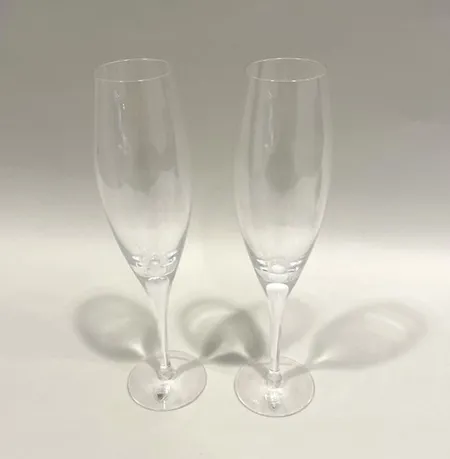 Fiskerulle Abu Ambassadeur 5500CS, Champagne edition, förgylld, Abu Garcia, 1952-2012, numrerad 277/500, med träsockel, Orrefors Intermezzo, två stycken champagneglas, höjd ca 24cm, manual samt förgylld slipsnål, originalkartong med slitage