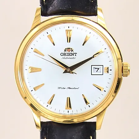 Herrur Orient, stål/doublé, automatisk, ref-nr: AC00-A0-A, serie-nr: B8E0032, datum, Ø40mm, original läderband med slitage, mineralglas med mindre repa, något repig boett, box med slitage, inga övriga tillbehör