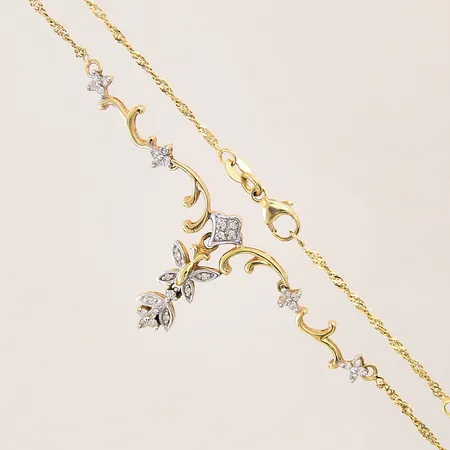 Collier med integrerat hänge med diamanter ca 30x0,01ct, längd: 45,5cm, bredd: 1,4-6,7mm, 18K  Vikt: 6,9 g