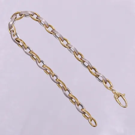 Armband tvåfärgad, ca 19cm, bredd 5mm, GHA. 18K Vikt: 7,2 g