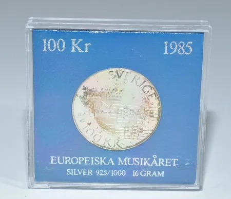 100kr silver år 1985 16 gr Europeiska Musikkåret, 39340:7 au 1811 Vikt: 16 g