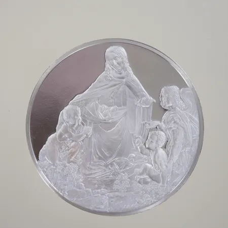 Mynt präglat Madonnan i grottan av Leonardo da Vinci, Ø 50 mm, 925/1000 Vikt: 100 g