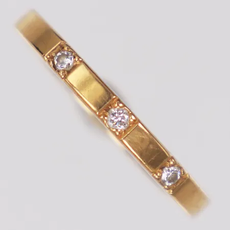 Ring, slät, diamanter 0,09ctv enligt gravyr och certifikat, stl 18½, bredd 2,3mm, Schalin, 18K Vikt: 4,1 g