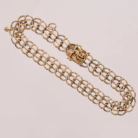 Armband, 18,5cm, bredd:9mm, öglor efter berlocker, 18K 15,3g.
