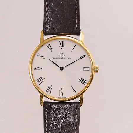Herrur Jaeger LeCoultre 18K, Ultra Thin, 32mm, quartz, refnr:140 111 1 N, serienr: 1636030, graverad boett, läderband ej original, går ej, batteribyte krävs, inga tillbehör.