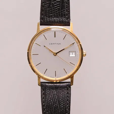 Herrur Certina 14K, 33,5mm, quartz, går ej, graverad, läderband, box.