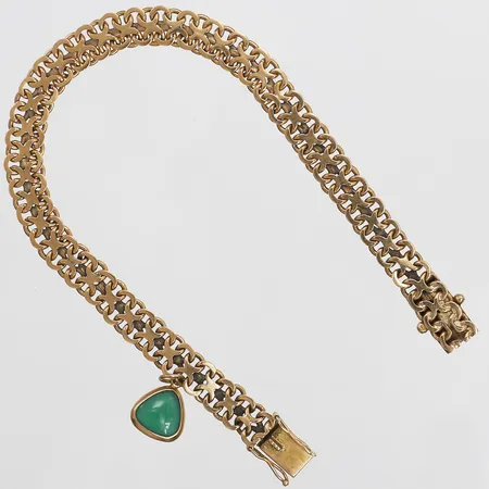 Armband med grön sten, X-länk, år 1956, längd: 19,5cm, bredd: 7 - 20 mm, 18K guld. Vikt: 15,6 g