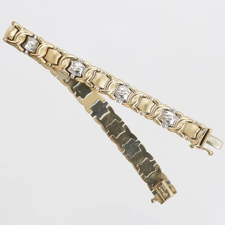Armband, tvåfärgat, längd: 19,5 cm, bredd: 9 mm, 14K guld. Vikt: 15,5 g