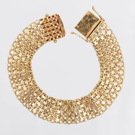 Armband, X-länk, längd 20cm, bredd 16mm, Aktiebolag Ädelsmycken, Stockholm, 1964, 18K guld.  Vikt: 30,5 g