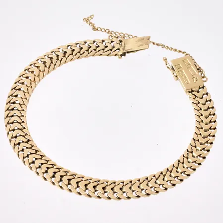 Armband i 18K guld, 18,5cm, Fiskben, bredd 7,2mm, säkerhetskedjan är av, tillverkad av Guldvaruaktiebolaget G. Dahlgren & Co Ab, år 1958, vikt 20,71g.