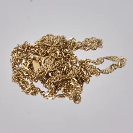 Defekt guld, 18K, vikt 1,2g.