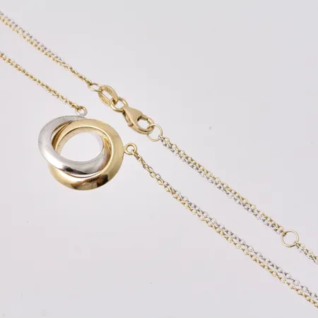 Collier i 18K guld/vitguld, 42cm och 45cm, Ankar i två rader, bredd 0,9mm, hänge, mått 13,6x15,5mm, tillverkad av Svedbom & Co AB, vikt 3,82g.