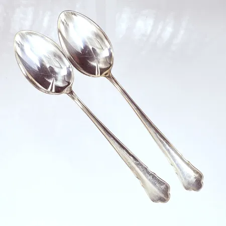 2  Bordsskedar Chippendale 18cm, silver 830/1000, GAB   Vikt: 73,7 g