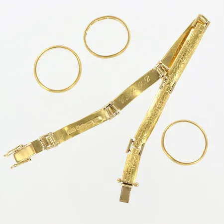 Tre ringar, ett armband, skevheter, gravyr, 23K Vikt: 38 g