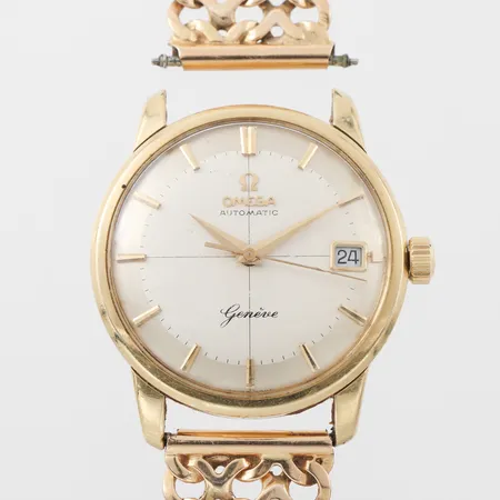 Herrur Omega Automatic Genevé, 18k i ur och band, tickar igång men ej funktionstestad, diameter 33 mm, längd totalt 20 cm, totalvikt 65.5 gram. Vikt: 0 g