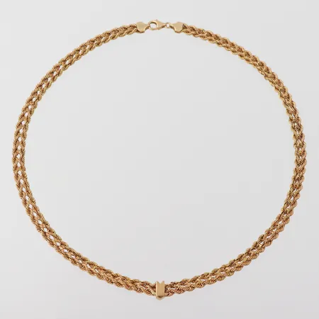 Collier, längd 44 cm, bredd 6,2 mm, 18 k. Vikt: 12,6 g