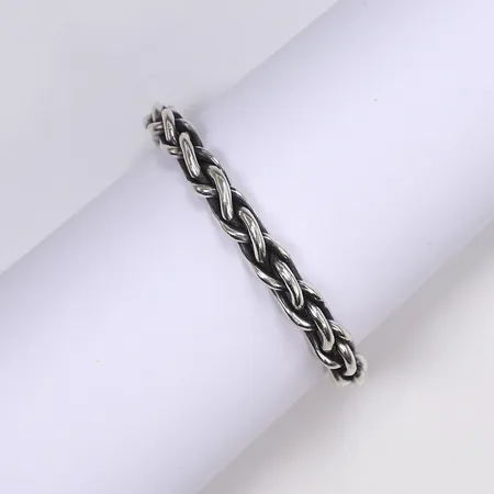 Armring, öppen, flätad, ca 64x46mm internt, bredd 8mm, Mexiko, något missformad, silver 925/1000 Vikt: 42,2 g