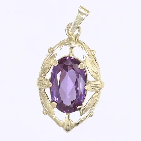 Hänge med lila sten, 38x20mm, sten något lös i fattning, 14K Vikt: 5,8 g