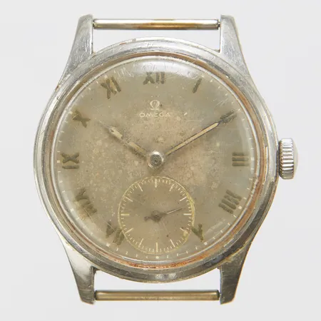 Herrur Omega Suverän, stål, manuell, 35,2mm, boettnr: 2400-6, Cal. 30 T2 PC, verknr: 10369578, ca 1944, repigt glas, kraftigt skadad urtavla samt visare, utbytt krona, inga tillbehör.