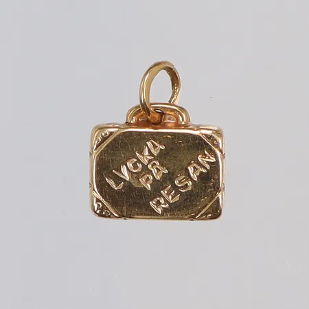 Hänge i form av Resväska 10x11mm inklusive hängöglan 18K Vikt: 0,6 g