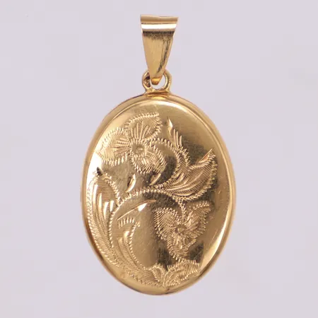 Hänge medaljong med floral dekor, längd 33,5mm, bredd 18,5mm, öppningsbar, minimala bucklor, 18K  Vikt: 4,3 g