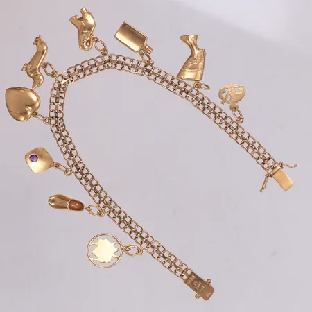 Armband X-länk med nio berlocker, längd 19cm, bredd 5,4-28,7mm, vissa berlocker med bucklor, 18K  Vikt: 12,5 g