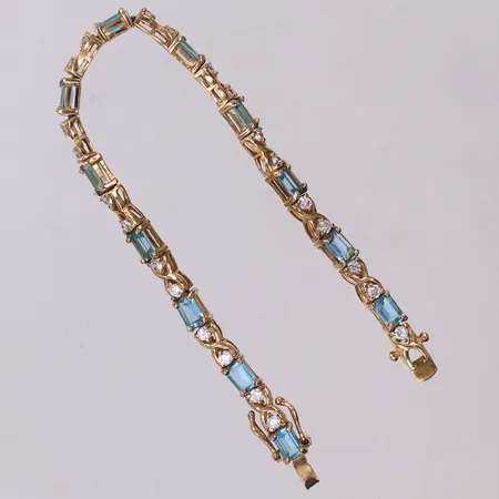 Armband med vita och ljusblå stenar, längd 18,5cm, bredd 5mm, förgyllt, silver 925/1000 Vikt: 12,9 g