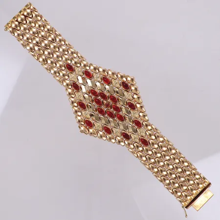 Armband, längd 20,5cm, bredd 29-62mm, röda stenar, bruksskick, 18K  Vikt: 96,4 g