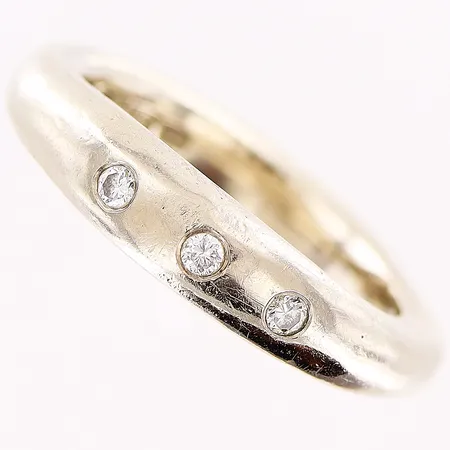 Ring, diamanter 3 x ca 0,03ct, stl 16¾, bredd 3-4,5mm, Kroon Bo, Malmö, vitguld, 18K Vikt: 9,6 g