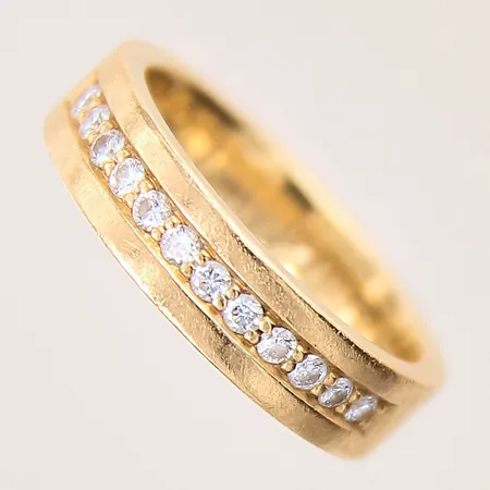 Ring med diamanter 0,24ct enligt gravyr, stl: 17, bredd: 5mm, gravyr, Schalins, 18K  Vikt: 7,4 g