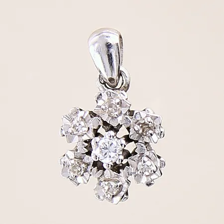 Hänge med diamanter 1 x ca 0,04ct samt 6 x 0,005ct, längd: 12mm, bredd: 3-8,8mm, vitguld, ostämplad, 18K  Vikt: 1,5 g