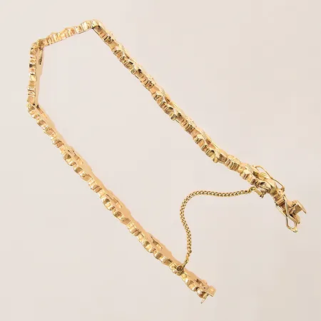 Armband med dekor och säkerhetskedja, längd: ca 18cm, bredd: 5,2-7,6mm, 18K  Vikt: 11,8 g