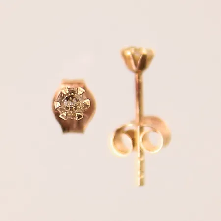 Ett par örhängen med vita stenar, Ø2,6mm, 18K  Vikt: 0,3 g