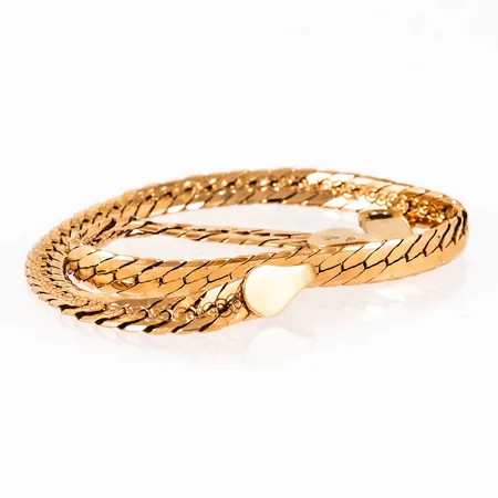 Defekt armband i 18K guld. Vikt: 7,1g.