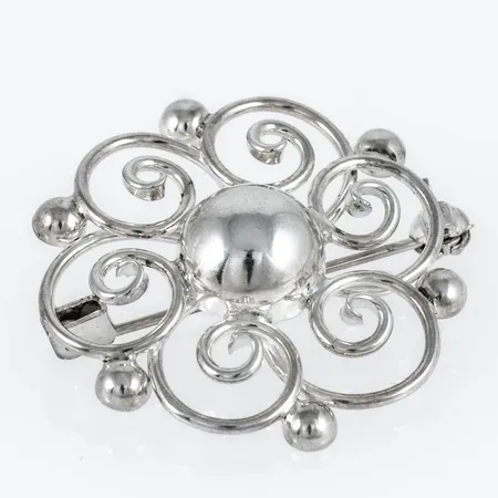 Brosch i silver (925/1000). Det är c:a 31,5 - 32,2 mm och väger 5,3g. Stämplad STERLING DENMARK, HS.