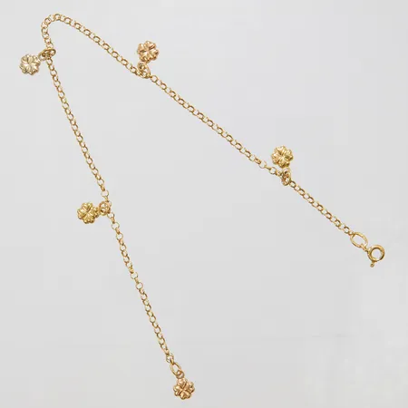 Vristlänk med fem integrerade berlocker, längd 23,8cm, bredd 2,2mm, trefärgad, 18K Vikt: 4,2 g