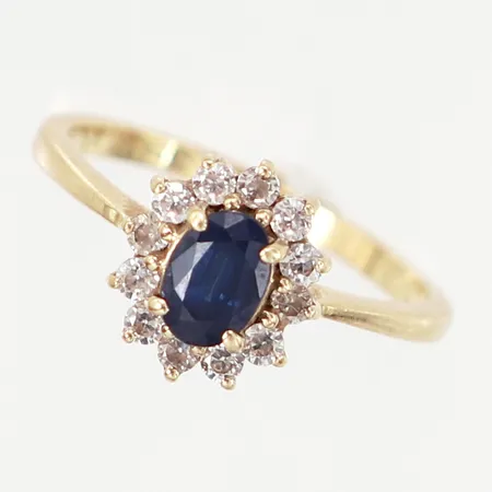 Carmoséring med vita stenar samt safir, stl 16¾, bredd: 1,5-10mm, 14K Vikt: 2,9 g