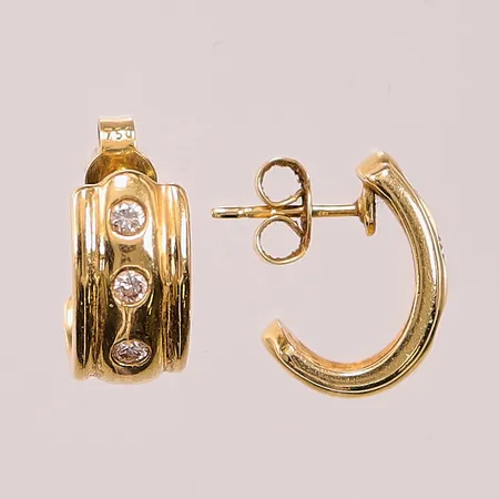 Ett par örhängen, diamanter 6x ca 0,04ct, 15mm, 18K 5,7g.