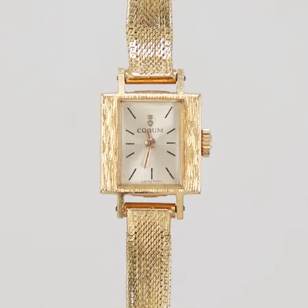 Damur Corum, 15,5 X 15,5mm, mekanisk, manuell, länk ej original, längd inklusive uret 15-16cm, länkens bredd 6,5mm, smärre ojämnheter, 18K Bruttovikt: 21,6g
