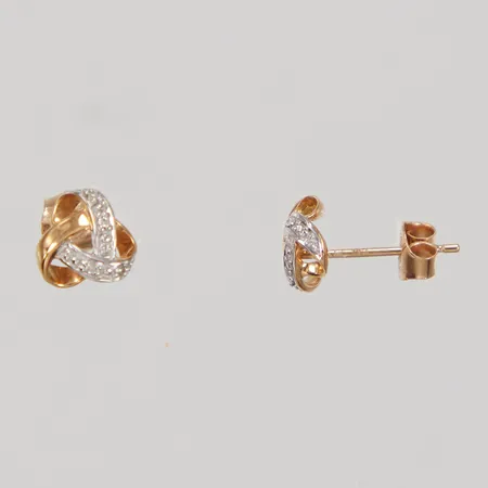 Ett par örhängen, Ø ca 7,5mm, åttkantslipade diamanter 8x ca 0,005ct, vitguldsinfattning, GHA, 18K Vikt: 1,7 g