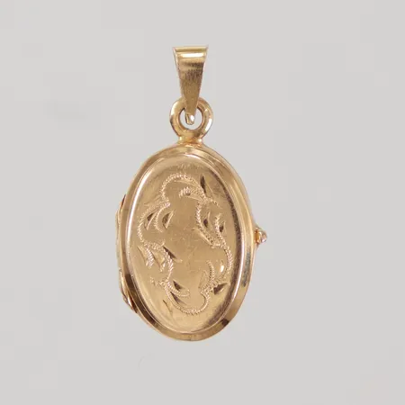 Hänge, medaljong, öppningsbar, längd inklusive ögla 25mm, bredd 13,5mm, plastglas invändigt, mönsterdekor, 18K. Bruttovikt: 3,5g Vikt: 0 g