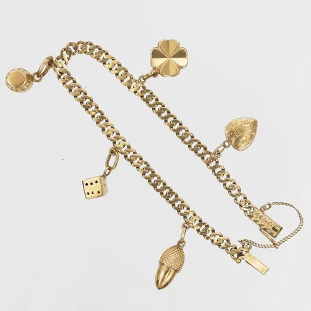 Armband med 5st berlocker, längd 18cm, bredd 5mm, 18K guld Vikt: 13,9 g