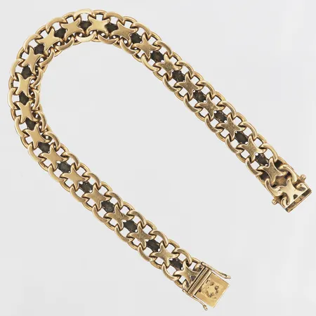 Armband, X-länk, Silema Ahlman & Co Firma, Stockholm år 1961, längd: 20,5 cm, bredd: 10 mm, 18K guld. Vikt: 33,3 g