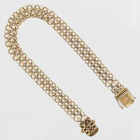 Armband, X-länk, Stockholms Ädelsmide AB, Solna år 1962, längd: 20,5 cm, bredd: 9 mm, 18K guld. Vikt: 14,4 g