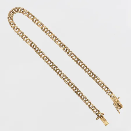 Armband, Bismarck, K & E Carlson, Göteborg år 1945, längd: 18,3 cm, bredd: 3,5 mm, säkerhetskedja saknas, 18K guld. Vikt: 4,2 g