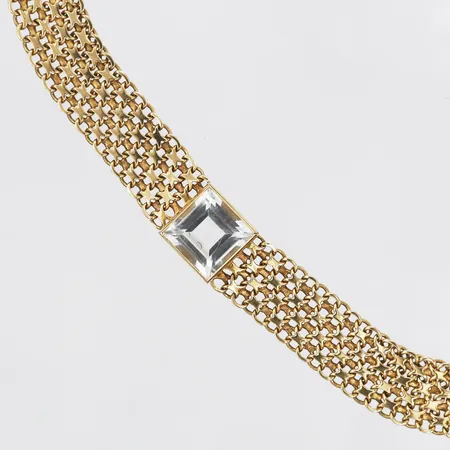 Collier med bergkristall, år 1921, X-länk, längd: 39 cm, bredd: 14 mm, mindre repor på sten, 18K guld. Vikt: 55,8 g