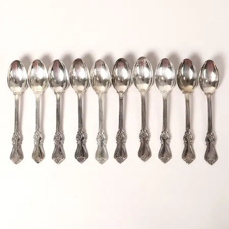 Tio kaffeskedar, modell Olga, GAB, Eskilstuna, 1900-talets slut, längd 12cm, slitage, silver Vikt: 162,8 g