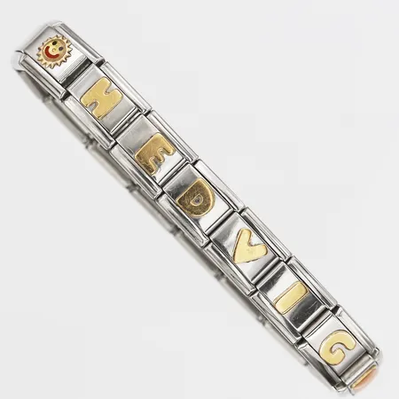 Armband, Nomination, med namndekor i 18K guld, flexiband med innermått om ca 60mm, rostfritt stål Vikt: 14,8 g